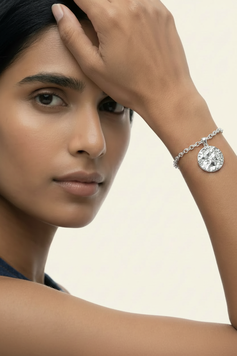 Lumière Medallion Charm Bracelet – Silver, model wrist close-up
