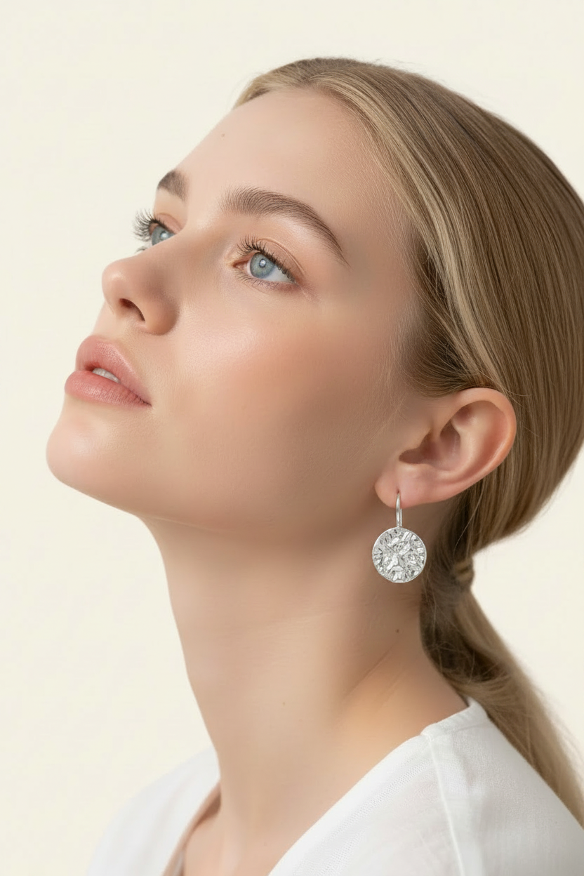 Lumière Coin Drop Earrings – Silver, model side profile